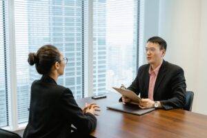 Recruiter speaking one to one with a candidate about a new role